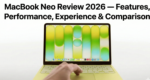 alt="MacBook Neo laptop on a modern desk, open and powered on, showing vibrant display and sleek aluminum design"
